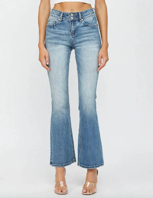 Comfy Chic Mid Rise Double Button Bootcut Jean In Light Wash